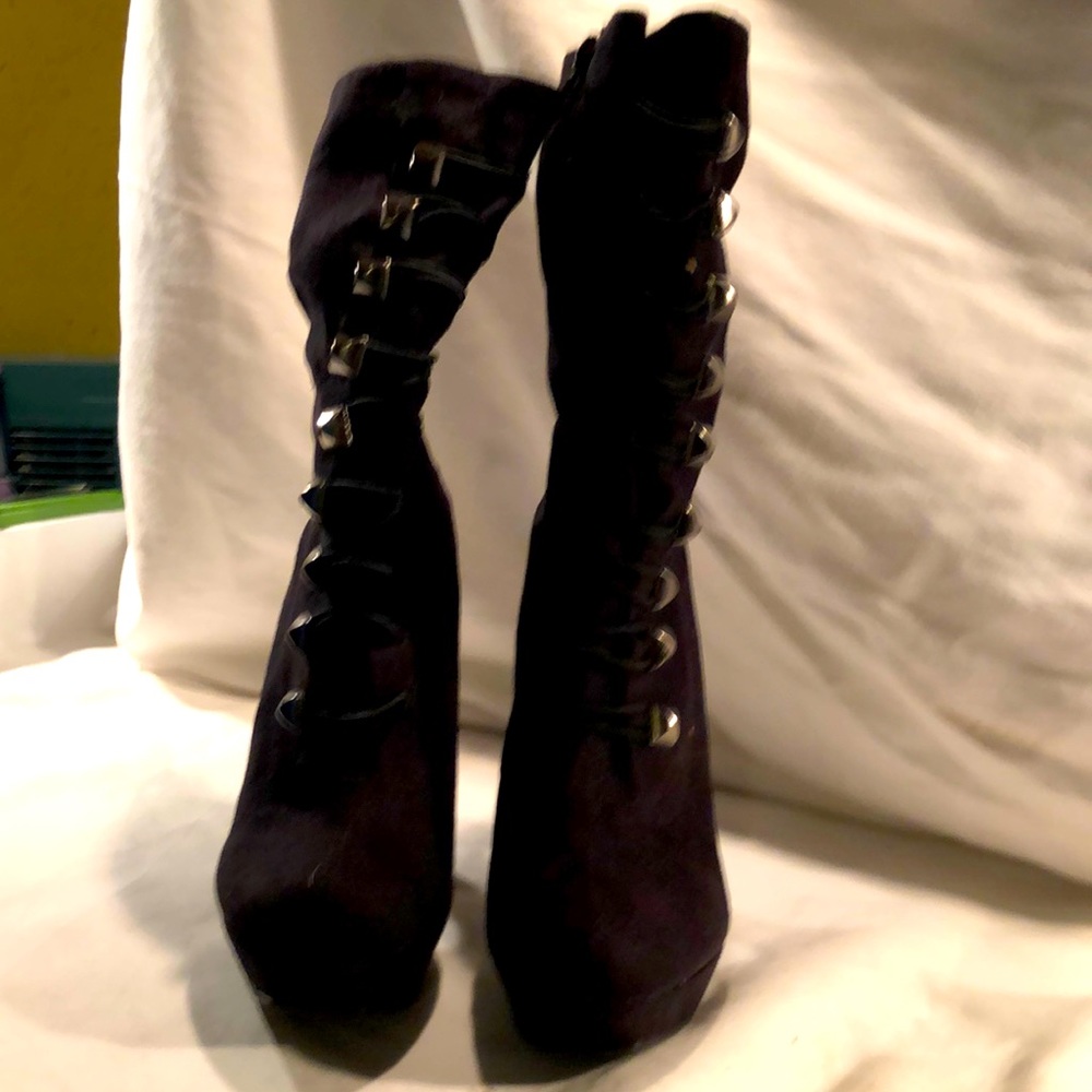 Black suede hidden wedge zipper boots lined with fleece on the inside